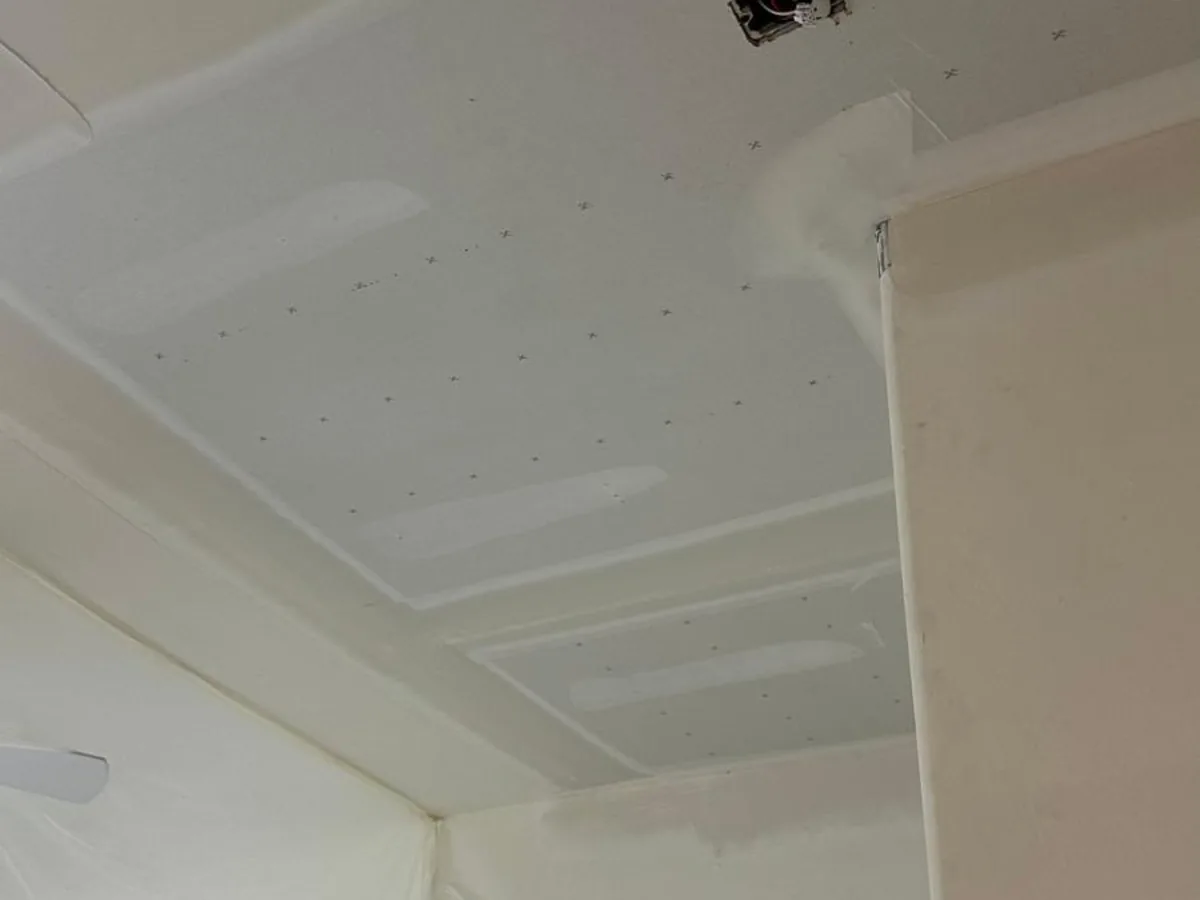 Ceiling and upper wall with taped and mudded seams